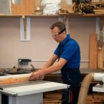 man-working-his-wood-shop-with-tools-equipment_23-2150861560.jpg